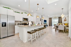 House, Multiple Beds, Pool Access (7227OL Solterra) | Private kitchen | Coffee/tea maker, electric kettle - Solterra Resort 7br Lakeview Villa Pool Spa Disney (Davenport)