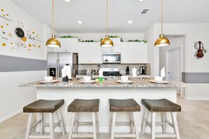 House, Multiple Beds, Pool Access (7227OL Solterra) | Private kitchen | Coffee/tea maker, electric kettle - Solterra Resort 7br Lakeview Villa Pool Spa Disney (Davenport)