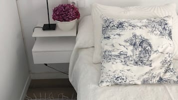 3 slaapkamers, een strijkplank/strijkijzer, beddengoed