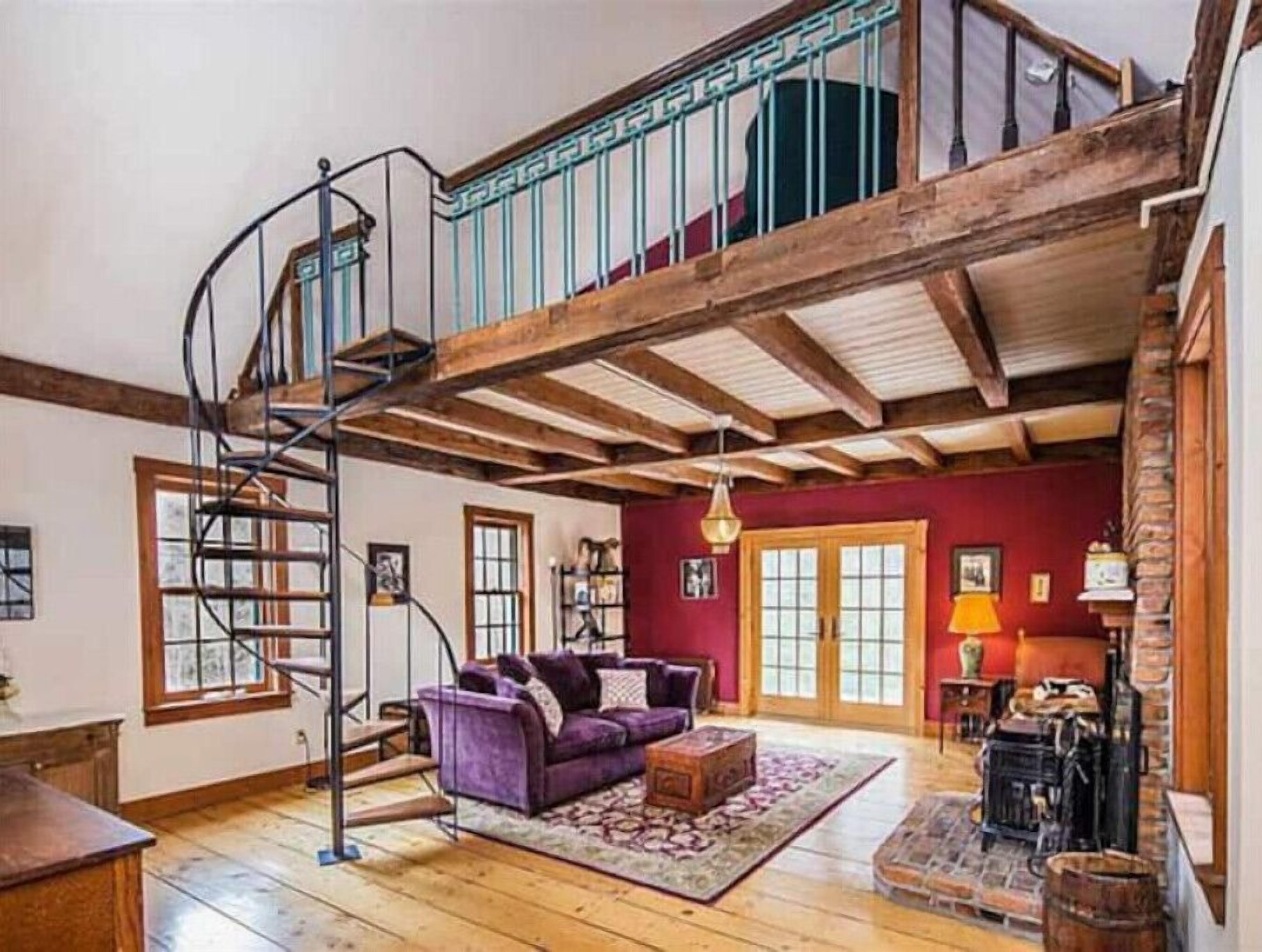 Caminetto, libri, biblioteca musicale, impianto stereo