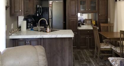 Tiny Park Home, deck, grill, hammock, trailer parking, 14 miles to Ft Benning