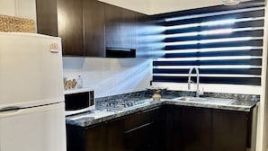 Coffee/tea maker, fridge, microwave, stovetop - Experience living like a local. (Mazatlan)