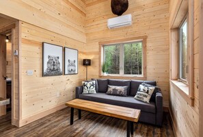 Living area - One of a kind views of Glacier National Park! Summit Cabin at Thunderbird Ridge. (Polebridge)