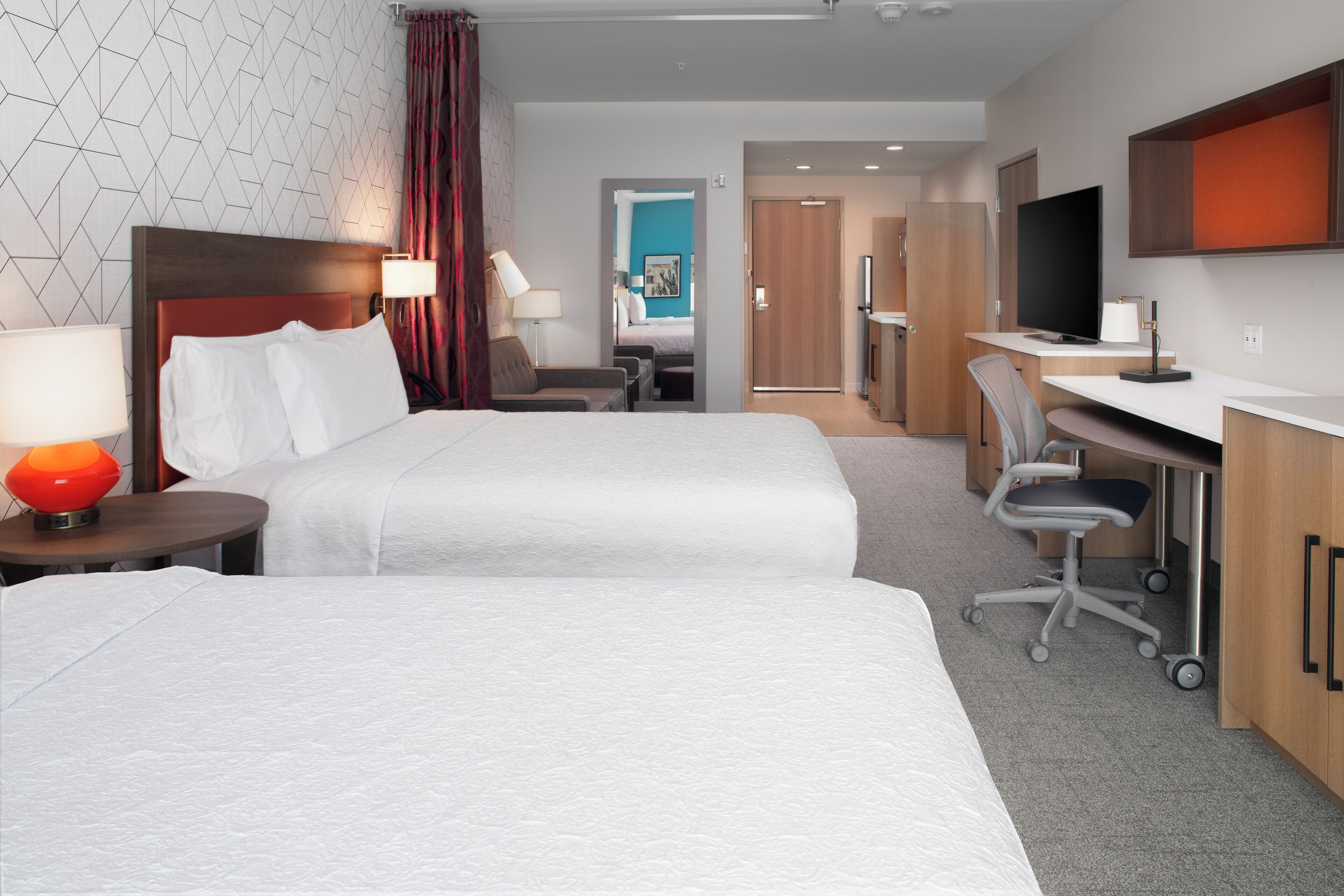 Pillow-top beds, desk, laptop workspace, blackout curtains