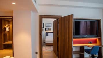 Family Room, 1 King Bed, Connecting Rooms | Premium bedding, in-room safe, blackout drapes, iron/ironing board