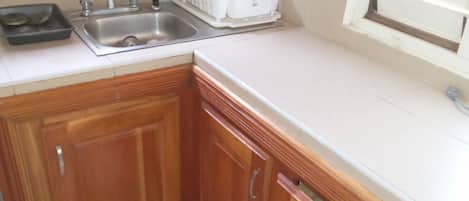 Fridge, stovetop, electric kettle, toaster