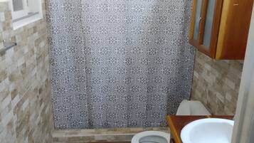 Shower, towels, soap, shampoo