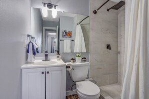 Hair dryer, towels, soap, shampoo
