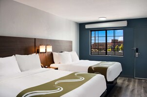 Standard Room, 2 Queen Beds, Non Smoking | Individually furnished, desk, laptop workspace, soundproofing