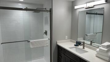 Shower, towels, soap, shampoo