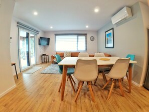 Apartamento Confort | Zona de estar | Una televisión