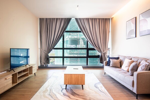 City Condo | Living area | Smart TV - Bangsar Trade Centre by Airhost (Kuala Lumpur)