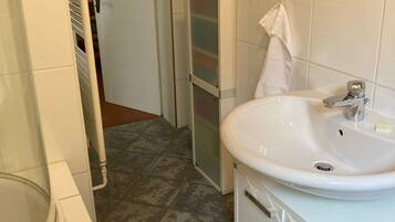 Bathtub, hair dryer, towels