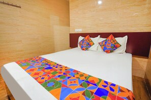 ห้องดีลักซ์ | ผ้าปูที่นอนฝ้ายอียิปต์, เครื่องนอนระดับพรีเมียม, ตู้นิรภัยในห้องพัก