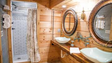 Shower, hair dryer, towels, shampoo