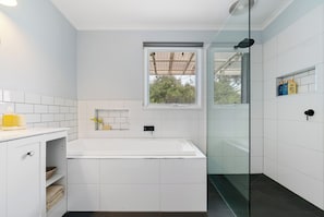 Shower, hair dryer, towels, soap