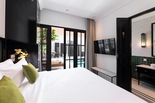 2 habitaciones, caja de seguridad en la habitación y escritorio