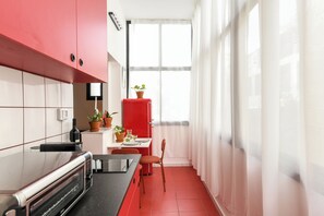 Apartment | Private kitchen - Lovely Studio Apt with Exquisite Crimson Interior near Talpiot Market (Haifa)