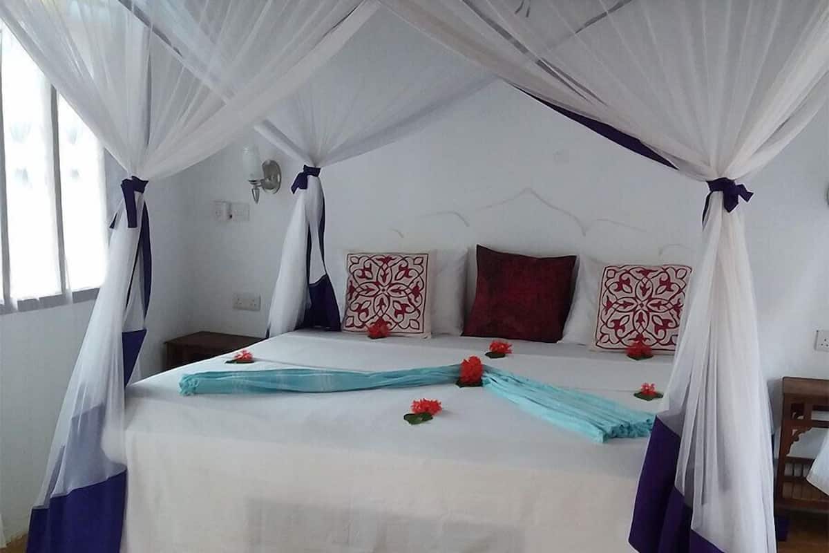 Comfort Double Room Single Use | 1 bedroom, down comforters, individually decorated, desk