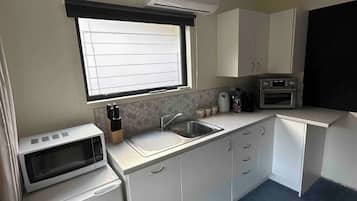 Fridge, microwave, coffee/tea maker, electric kettle