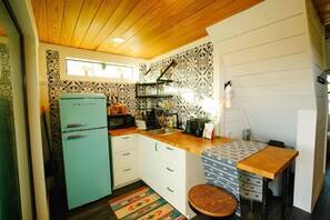 Fridge, microwave, stovetop, coffee/tea maker