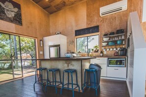 Enjoy cooking in this well-equipped kitchen with a central island and ample storage.
