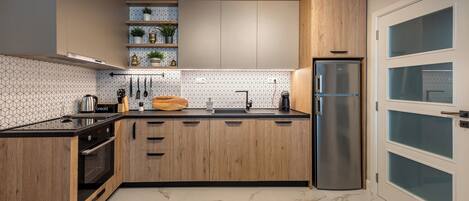 Apartamento de lujo, 3 habitaciones | Cocina privada | Frigorífico pequeño, horno, lavavajillas y cafetera o tetera