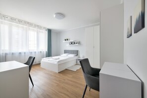 Deluxe Apartment, 1 Bedroom, Ensuite, City View | 1 bedroom, individually decorated, individually furnished, desk