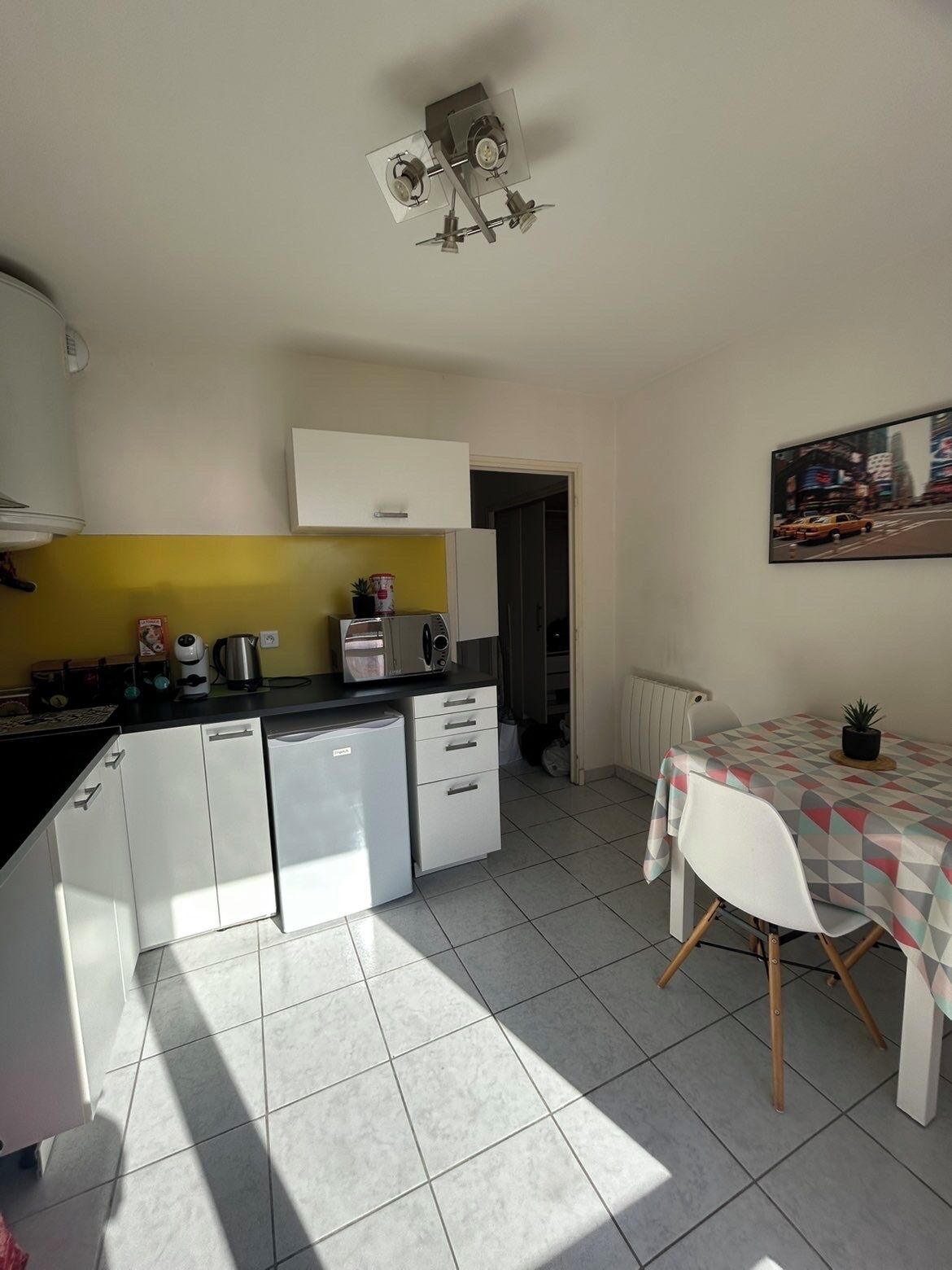 Fridge, microwave, stovetop, coffee/tea maker