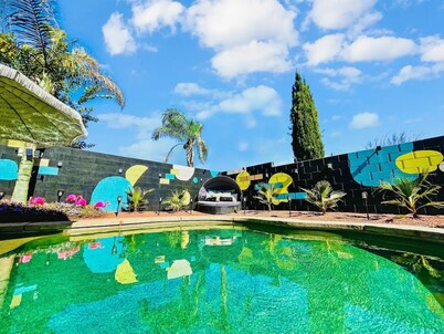 The Jungalow: Luxe Jungle Vibes Meet Modern Desert Living w/ Lagoon Style Pool