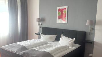 Basic-Doppel- oder -Zweibettzimmer | Verdunkelungsvorhänge, schallisolierte Zimmer, Bügeleisen/Bügelbrett