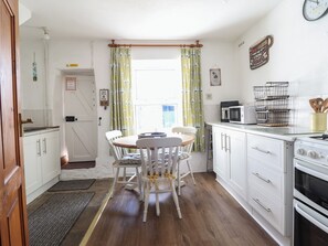 Fridge, electric kettle, toaster, cookware/dishes/utensils