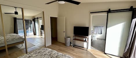 Primary bedroom has spa-like ensuite bathroom and a large closet