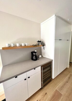 Coffee bar with dual-zone wine fridge