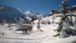 Experience the thrill of skiing and breathtaking mountain views from the resort's ski lift and circular viewing platform.
