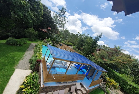 Outdoor pool, pool loungers. Claro de Luna