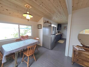 Dining - On the waters edge of Lake Cecebe Tranquility above Muskoka at Rockwynn Cottages (Burk's Falls)