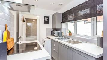 Fridge, microwave, oven, cookware/dishes/utensils