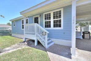 A single-story house with a covered porch and a 'Private Property' sign.