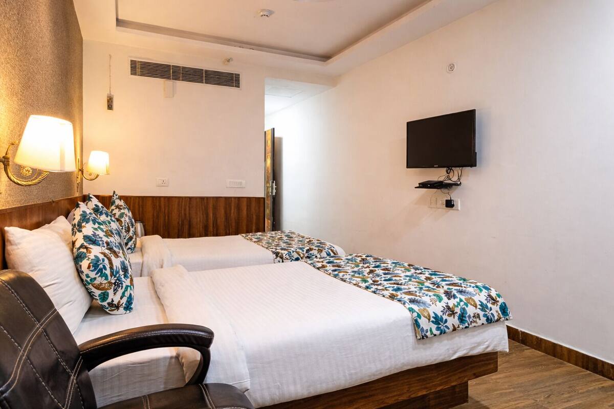 Chambre avec lits jumeaux | Literie de qualité, minibar, bureau