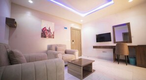 Standard-Einzelzimmer, 1 King-Bett, Nichtraucher | Wohnbereich