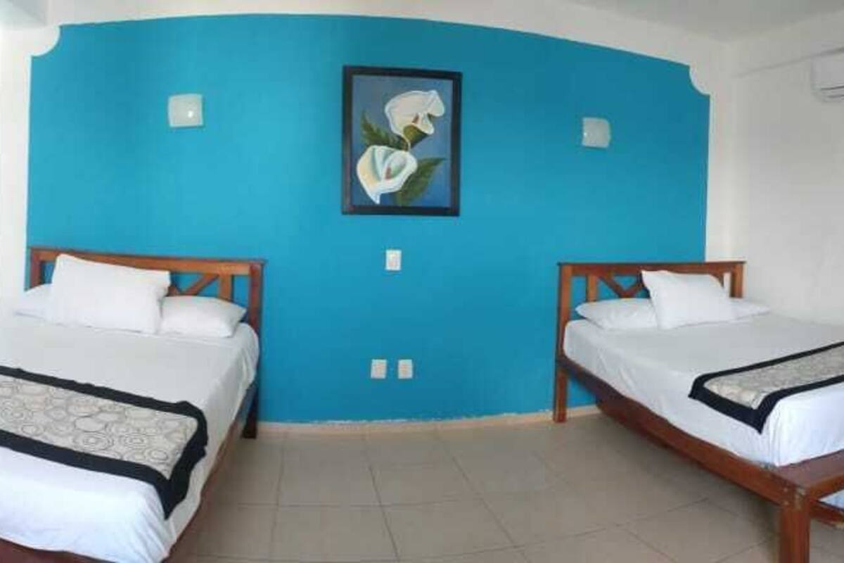 Family Room | Desk, laptop workspace, WiFi (free), bed sheets
