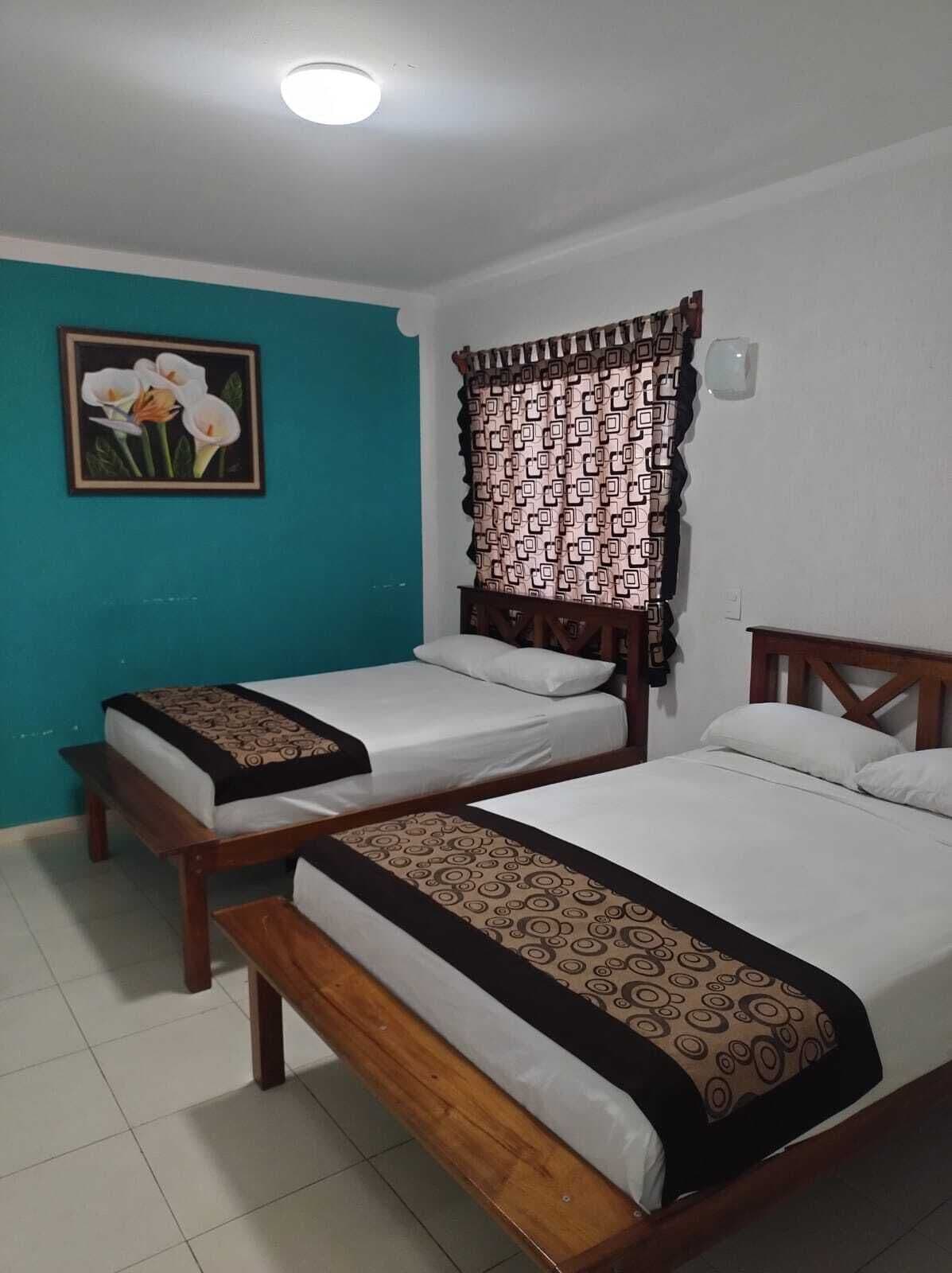 Standard Quadruple Room | Desk, laptop workspace, WiFi (free), bed sheets