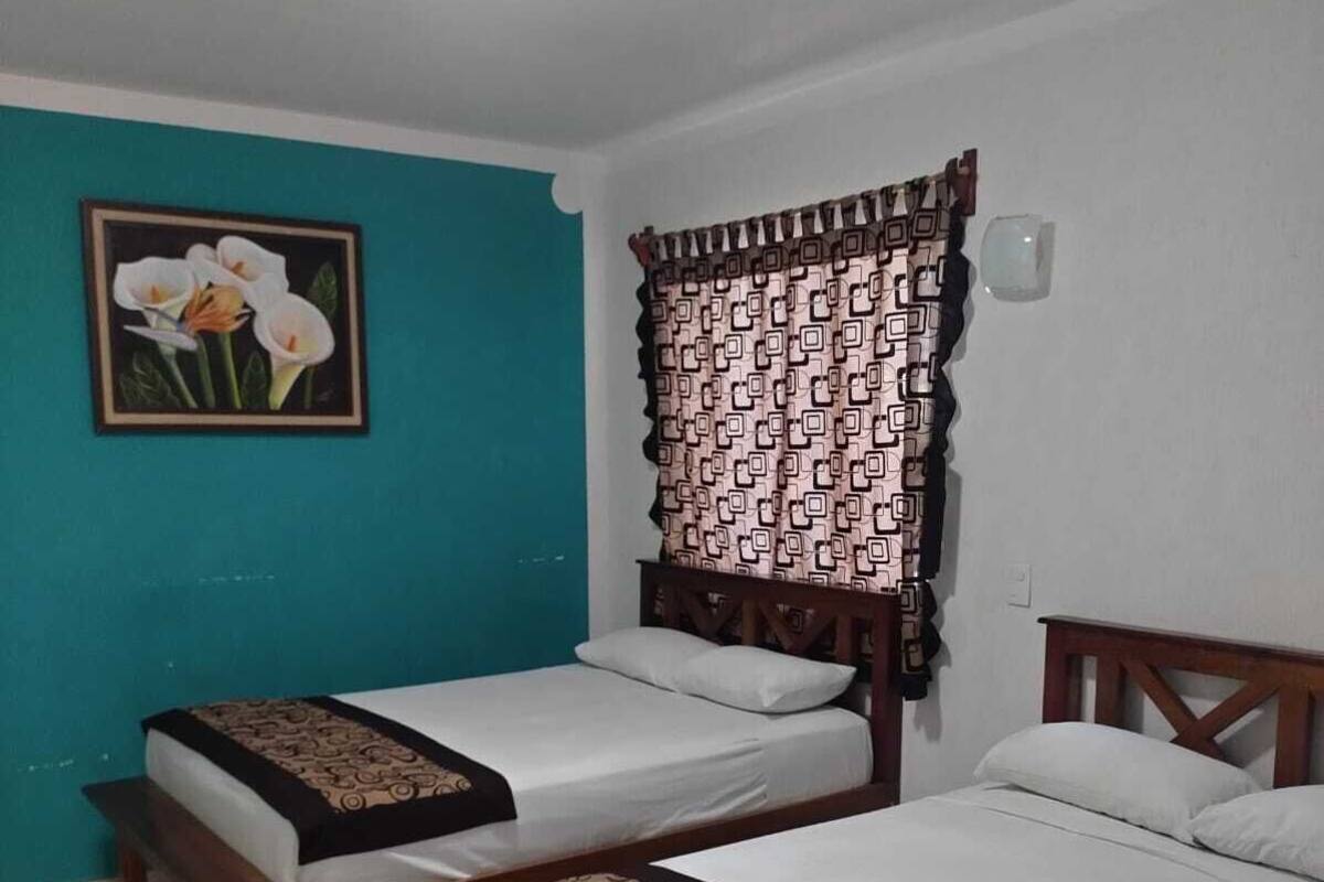 Standard Quadruple Room | Desk, laptop workspace, WiFi (free), bed sheets