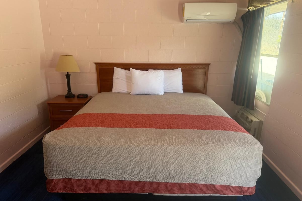 Desk, blackout drapes, WiFi (free), bed sheets