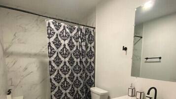 Shower, towels, soap, shampoo