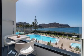 Outdoor dining - Home2Book Gorgeous Oceanfront Studio Mogán, Views (Mogán)