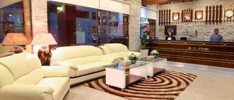 Deluxe Apartment, 2 Bedrooms, City View, Tower | Living area | Flat-screen TV