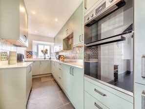 Dishwasher, high chair, cookware/dishes/utensils