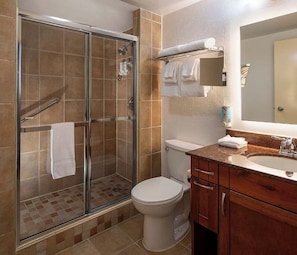 Shower, towels, soap, toilet paper